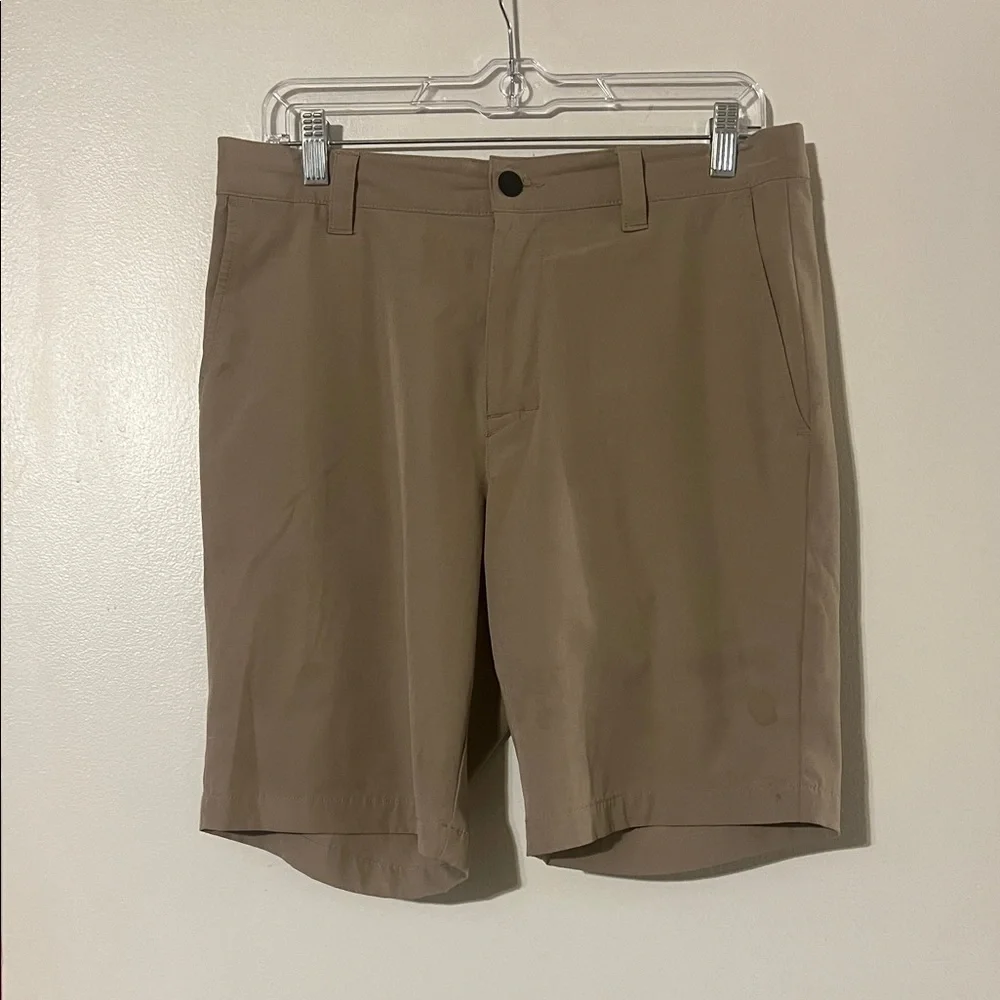 Banana Republic flat front tan shorts. Back elastic waist for comfort.